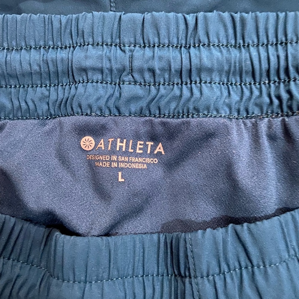 Athleta running shorts, 4 inch, teal size L.